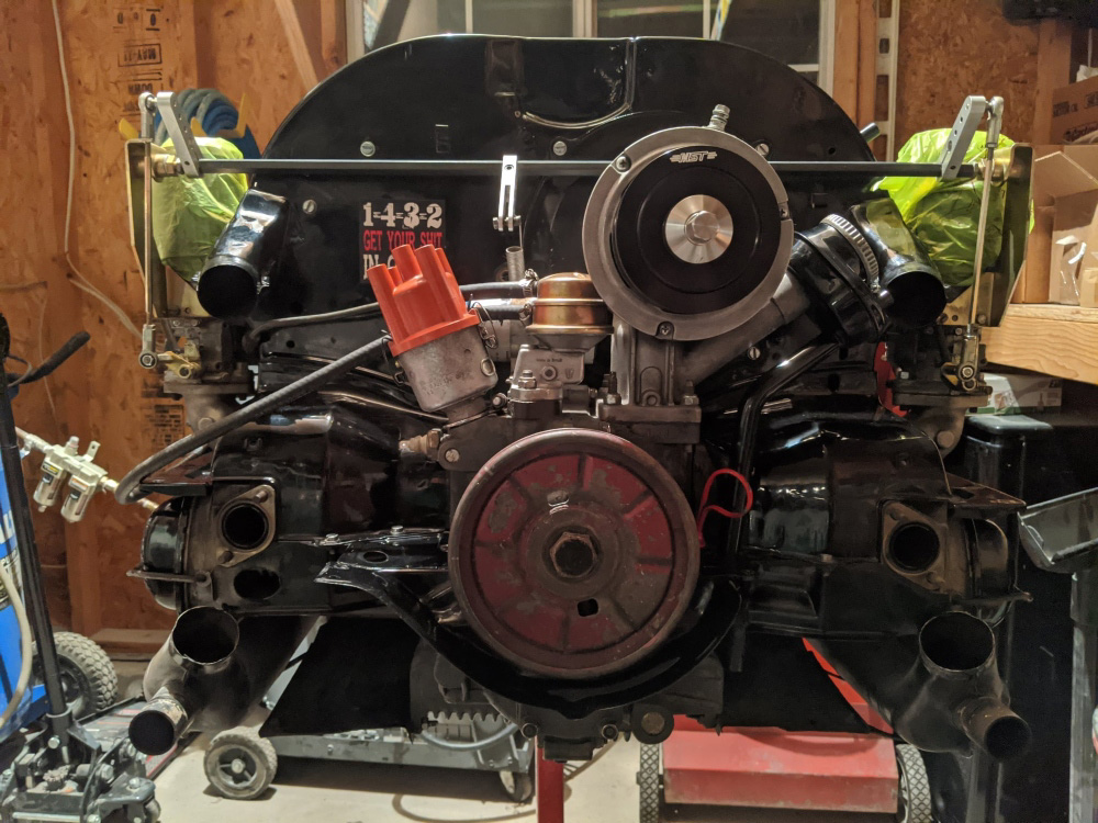 Rebuilt Volkswagen Beetle engine after restoration, showing a clean and detailed engine bay.