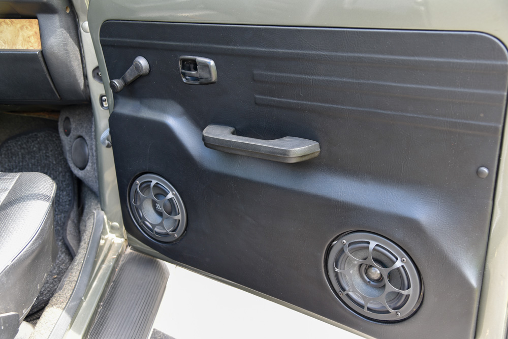Custom Super Beetle door panel with upgraded speakers installed as part of the audio system