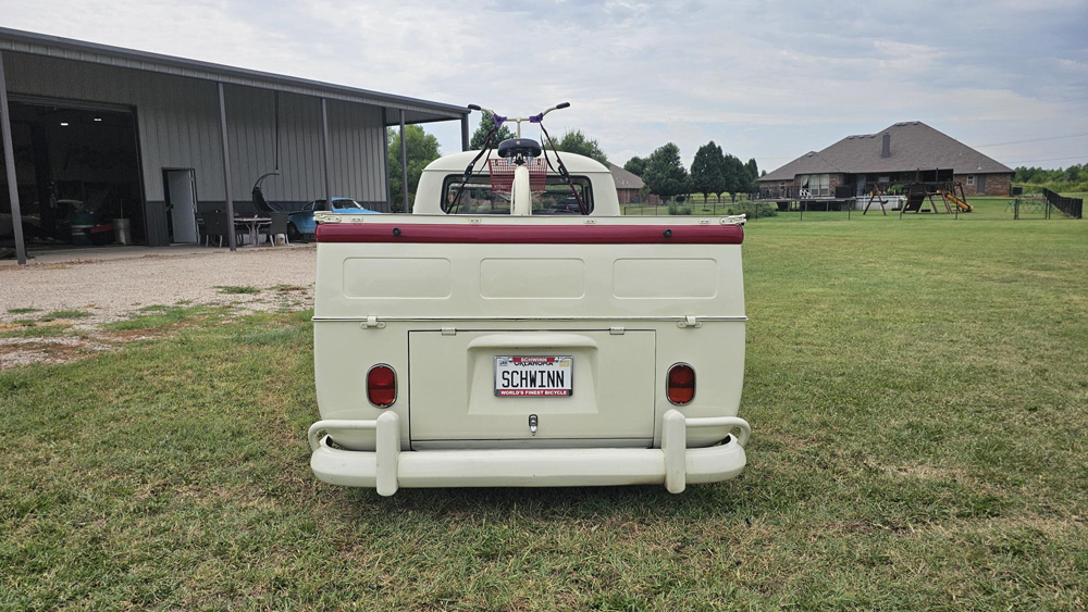 Rear view of The Dude VW Single Cab with Schwinn plate and bicycle in the truck bed