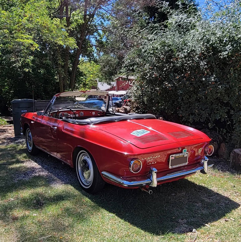 Type 34 Ghia rear shot parked under a tree
