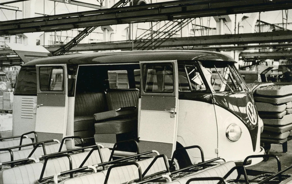 VW bus in two-color paint finish during installation of the interior. Wolfsburg, 1955.