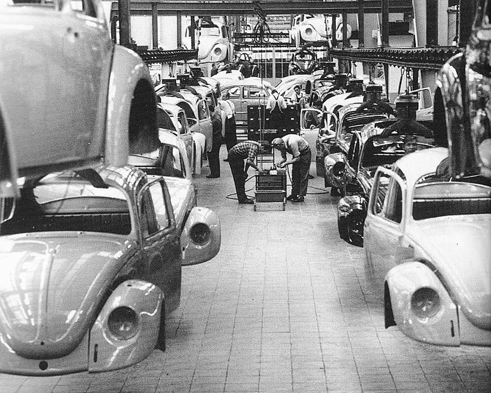Painted bodyshells arrive in a hall at Volkswagen Emden prior to fitting out and final assembly in 1969