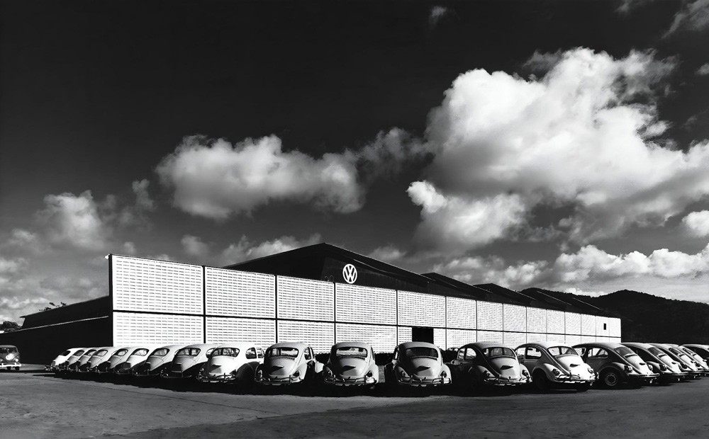 New cars lined up outside the main production hall at Volkswagens plant in Venezuela