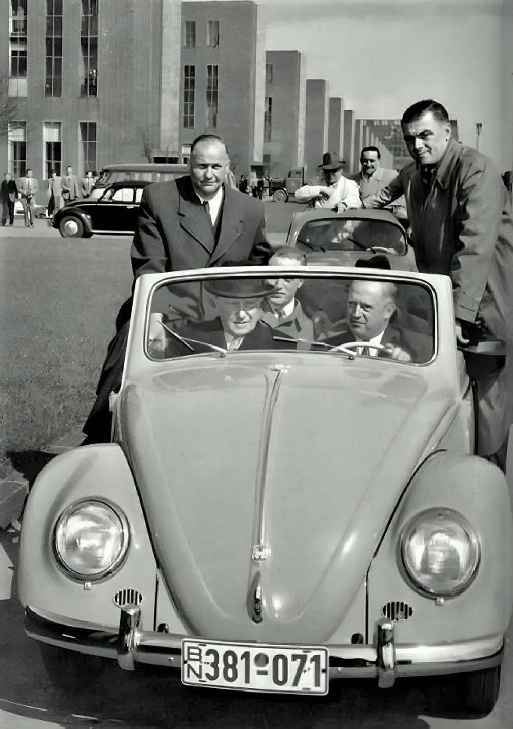 Konrad Adenauer touring Volkswagenwerk Wolfsburg in a Cabriolet on 22 April 1955.