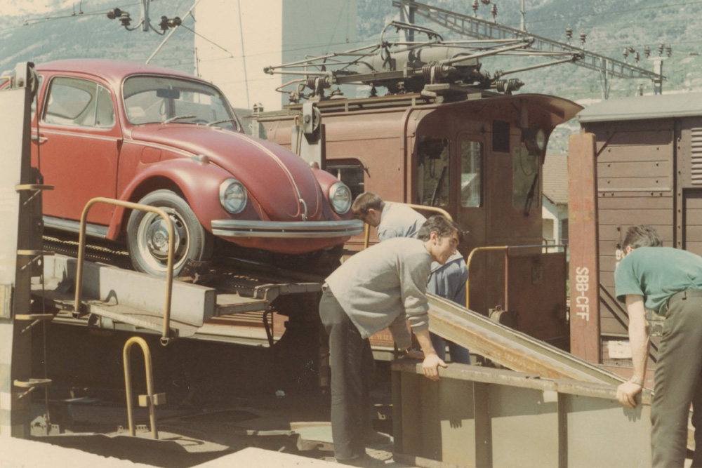 1969 delivery of new Volkswagens at dealership in Visp Switzerland